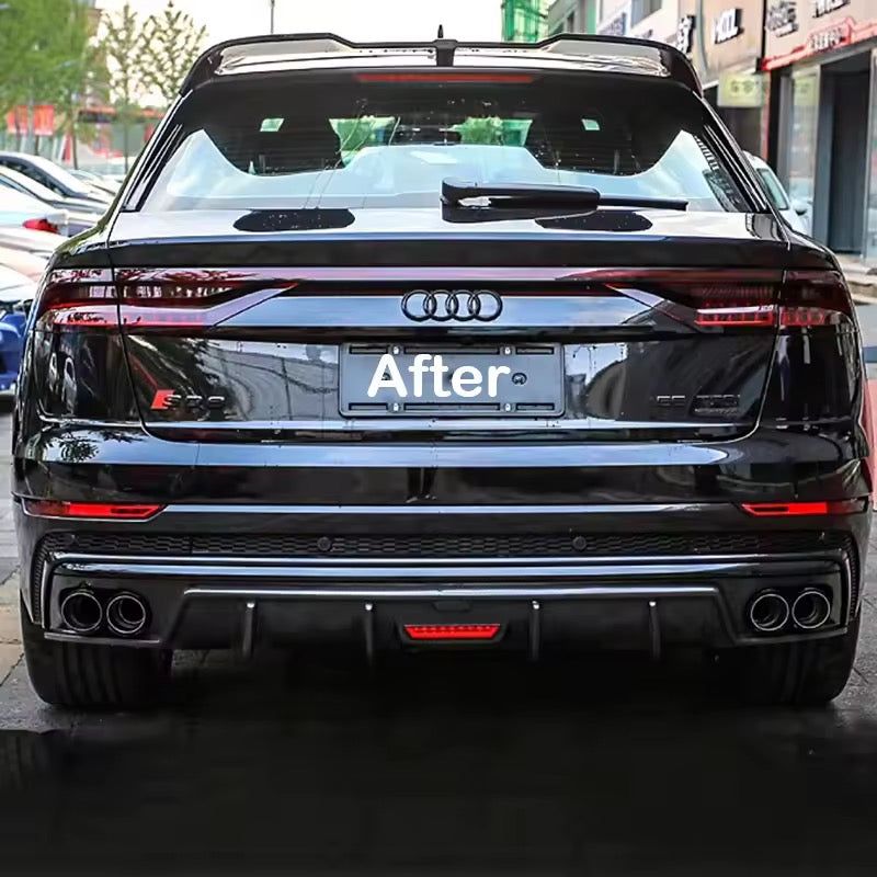 Audi Q8 met vier ronde uitlaatsierstukken, montagevoorbeeld
